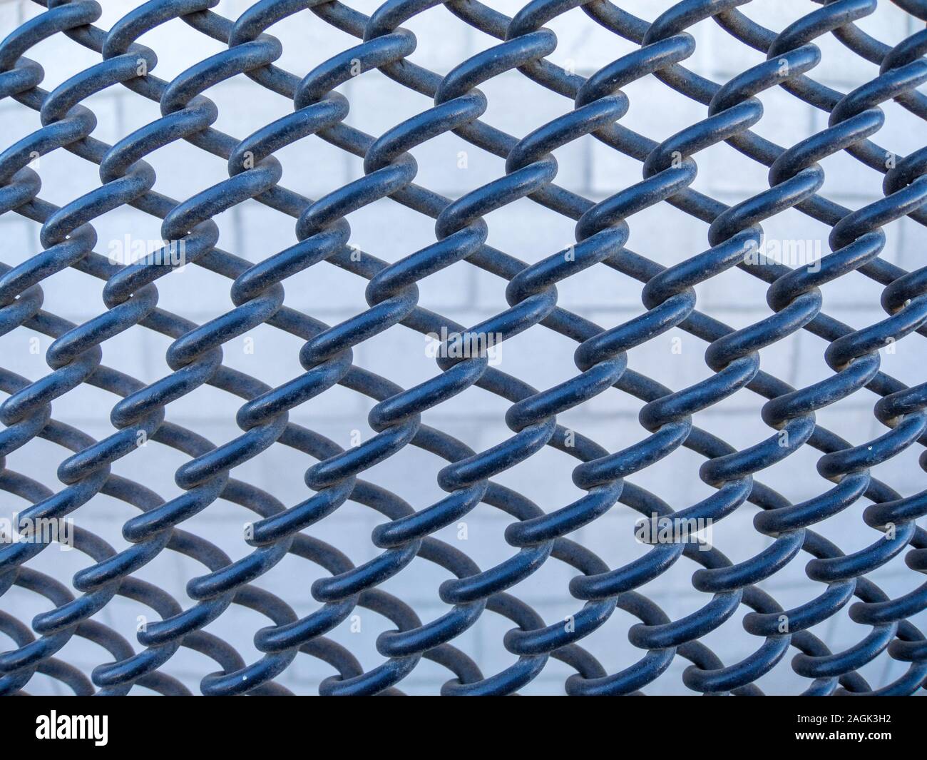 rubber coated chain link fence background Stock Photo Alamy