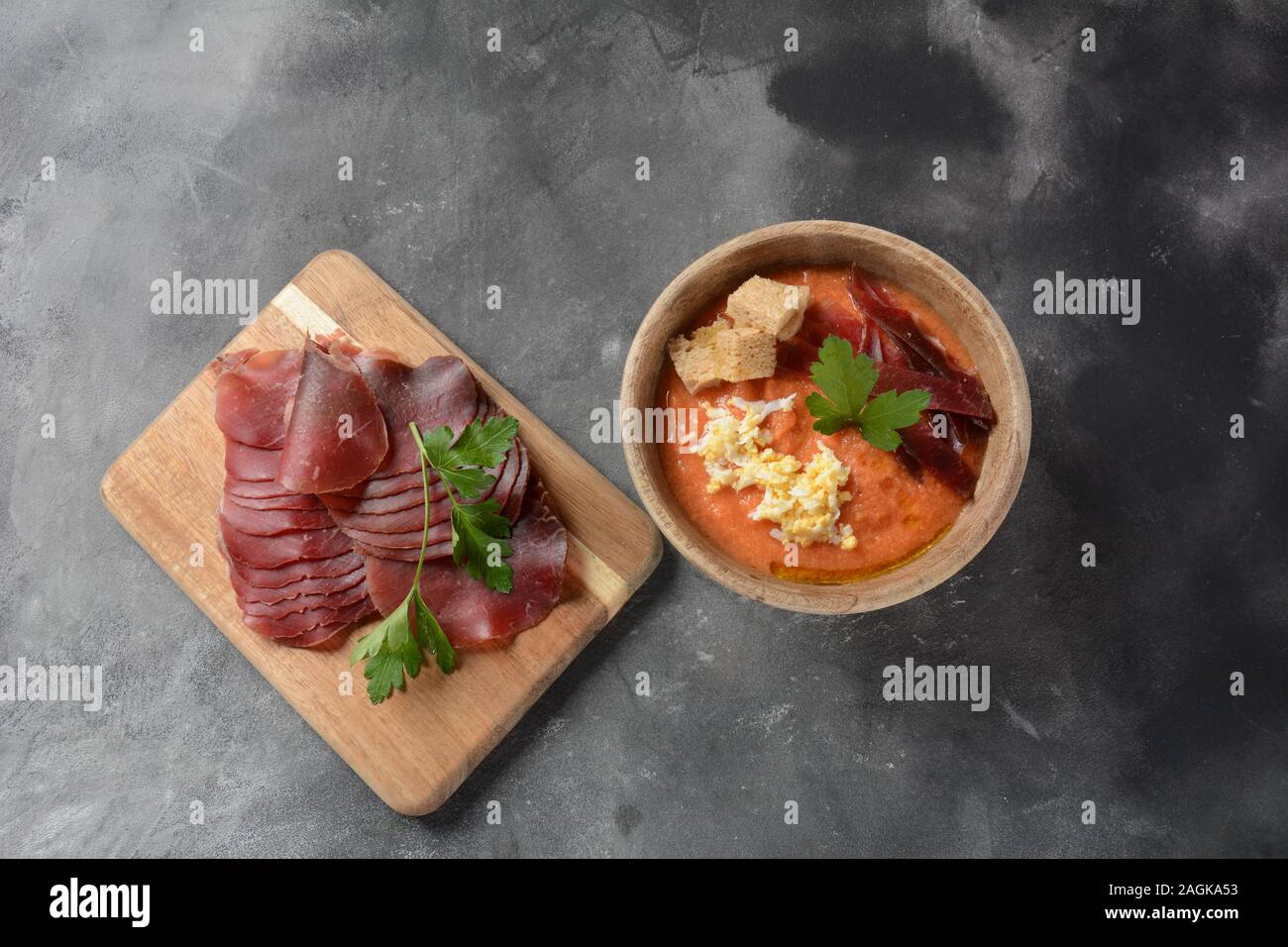 Traditional Spanish andalusian tomato cream soup Salmorejo served with