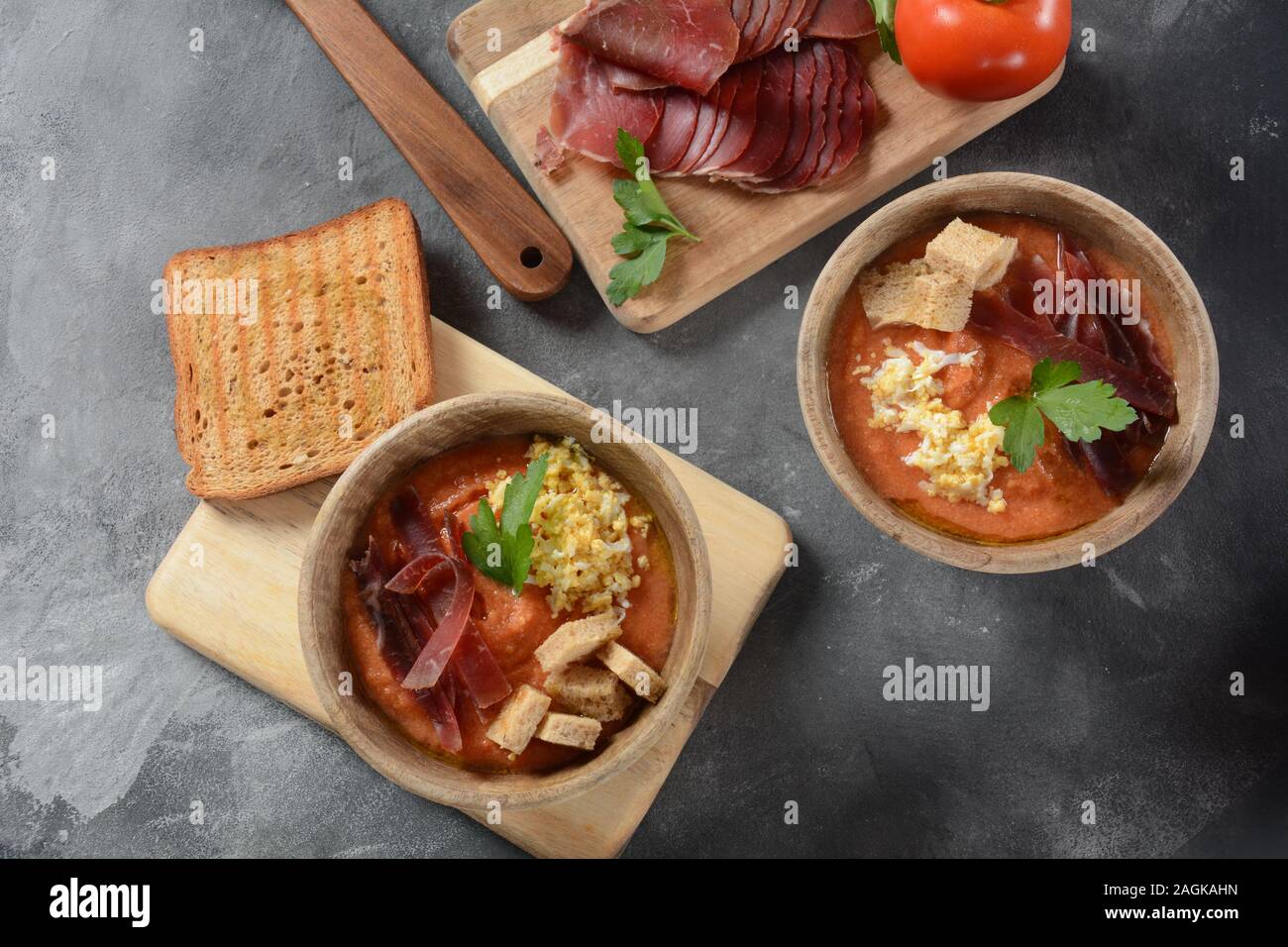 Traditional Spanish andalusian tomato cream soup Salmorejo served with