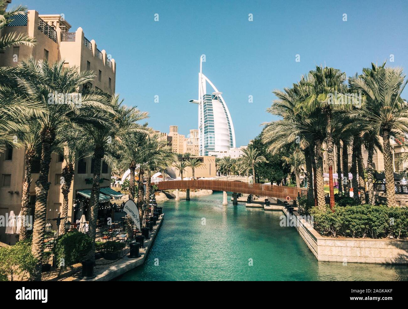 Dubai, UAE - Dec 9, 2018. View of Burj Al Arab hotel from Madinat Jumeirah. Madinat is a luxury resort which includes hotels and souk covering an area Stock Photo