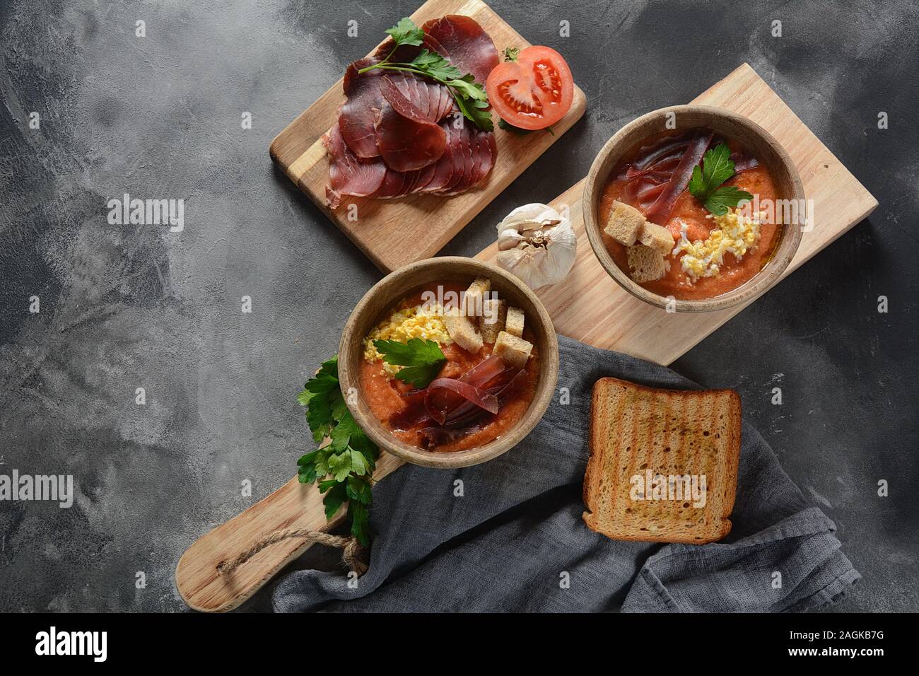 Traditional Spanish andalusian tomato cream soup Salmorejo served with