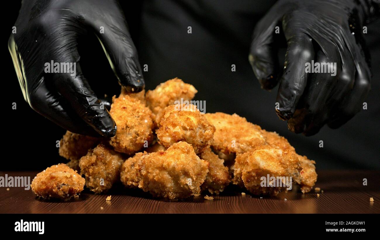 Cool beautiful fresh juicy cooked chicken wings in breading. Buffalo