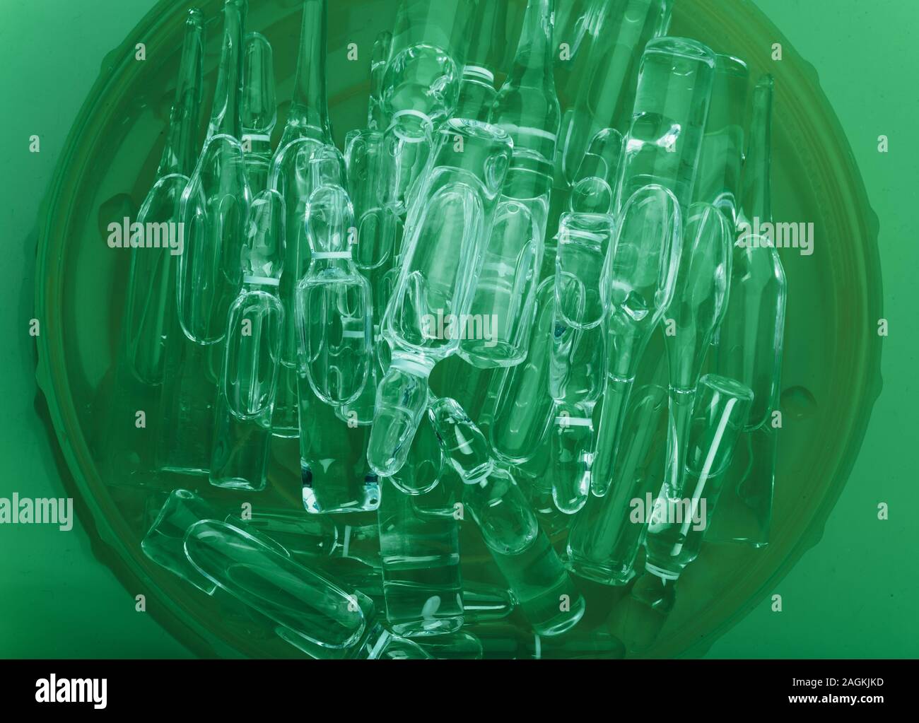 Glass medical ampoule vial for injection. Medicine is liquid sodium