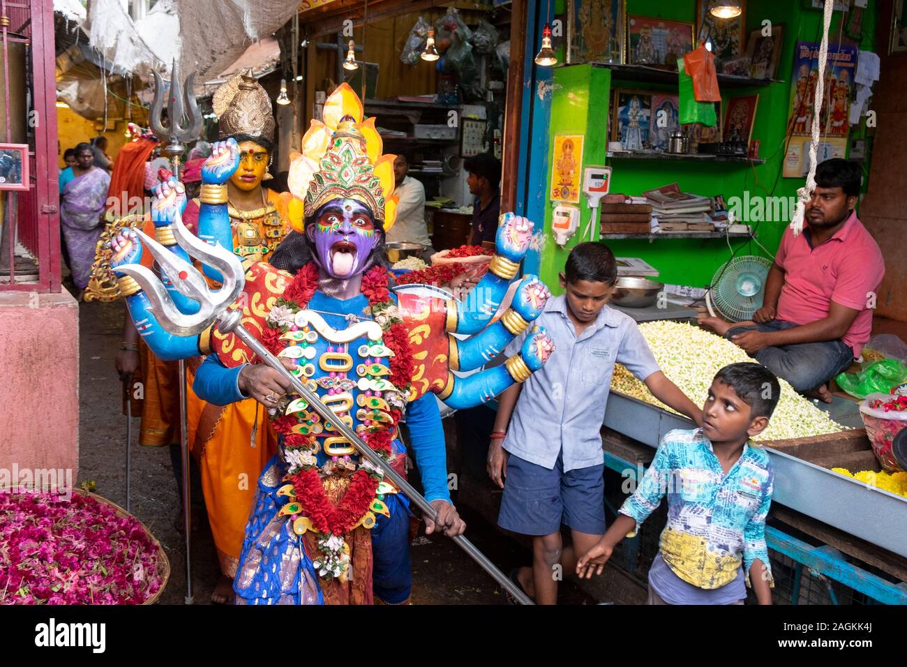 Group dressed as Hindu deities walking through Goubert Market during the religious festival, Puducherry, Tamil Nadu, India Stock Photo