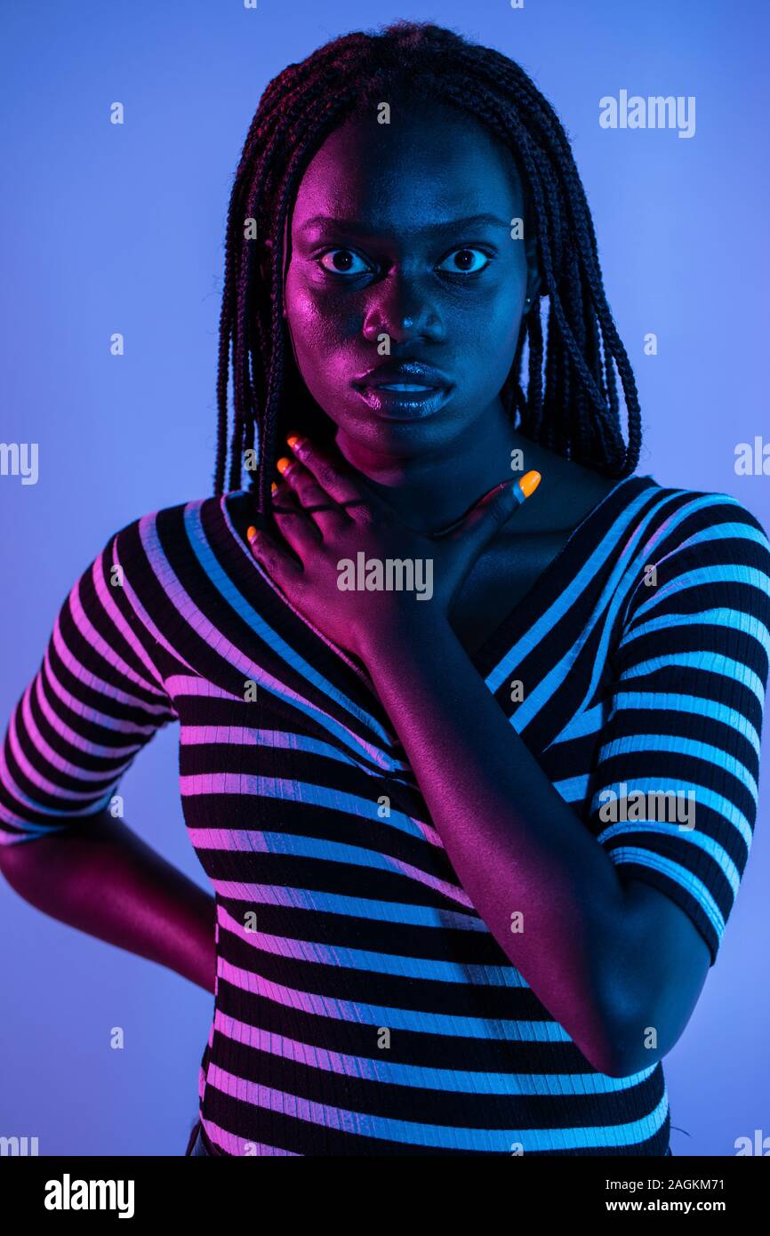 Romantic African Girl Dancing With Eyes Closed On Purple