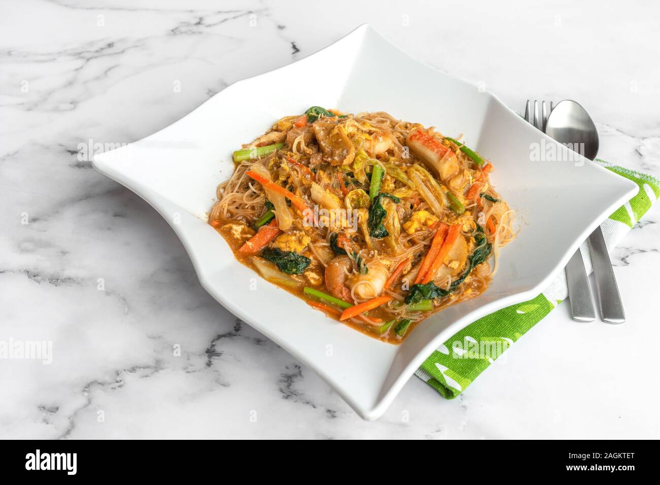 Hailam Mee Hoon or known as rice vermicelli with gravy, is an Asia dish braised with dark and light soy sauce. Stock Photo