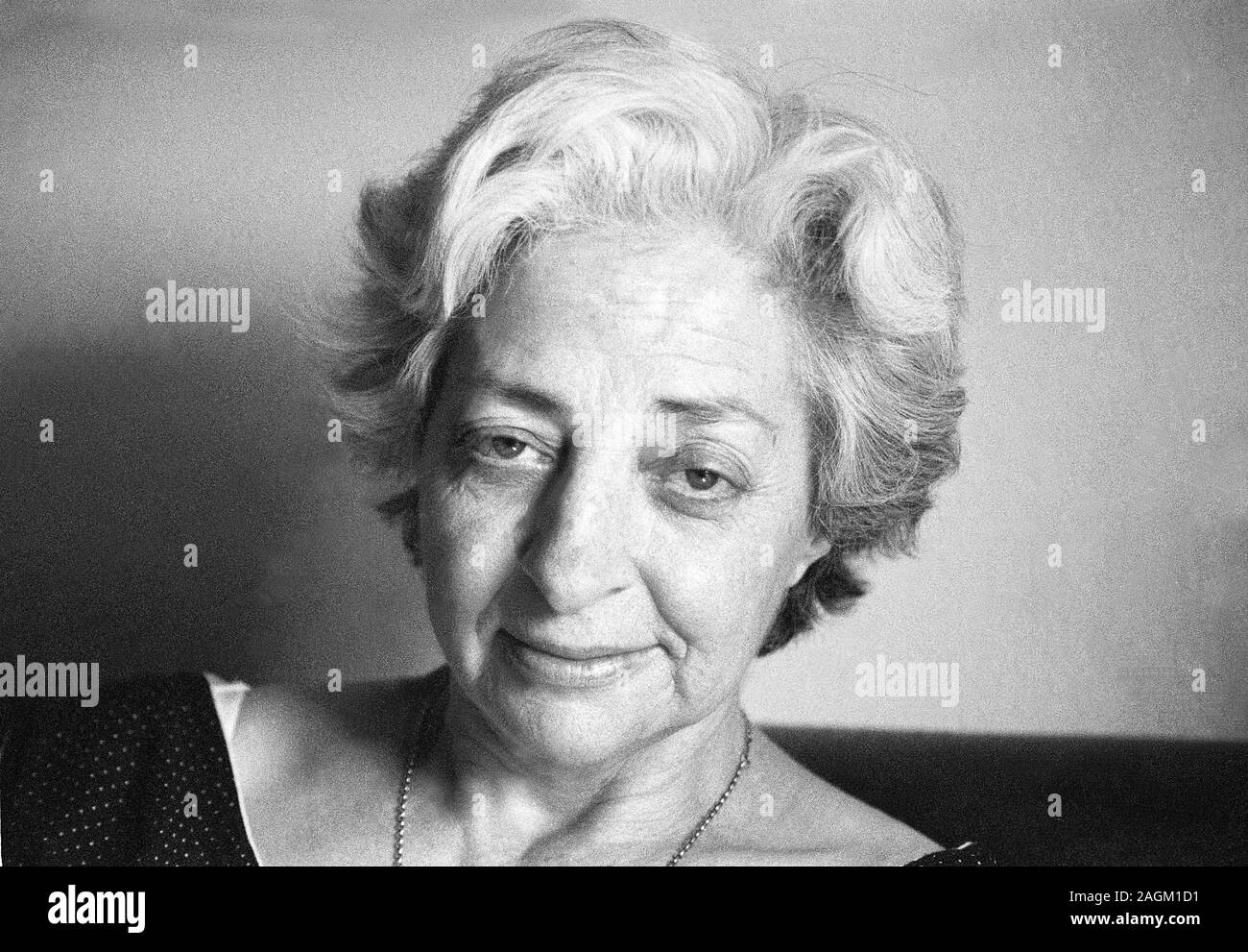 Black and white portrait of a smiling elderly woman with gray hair in a  floral dress by Linda M. Photo stock - StudioNow