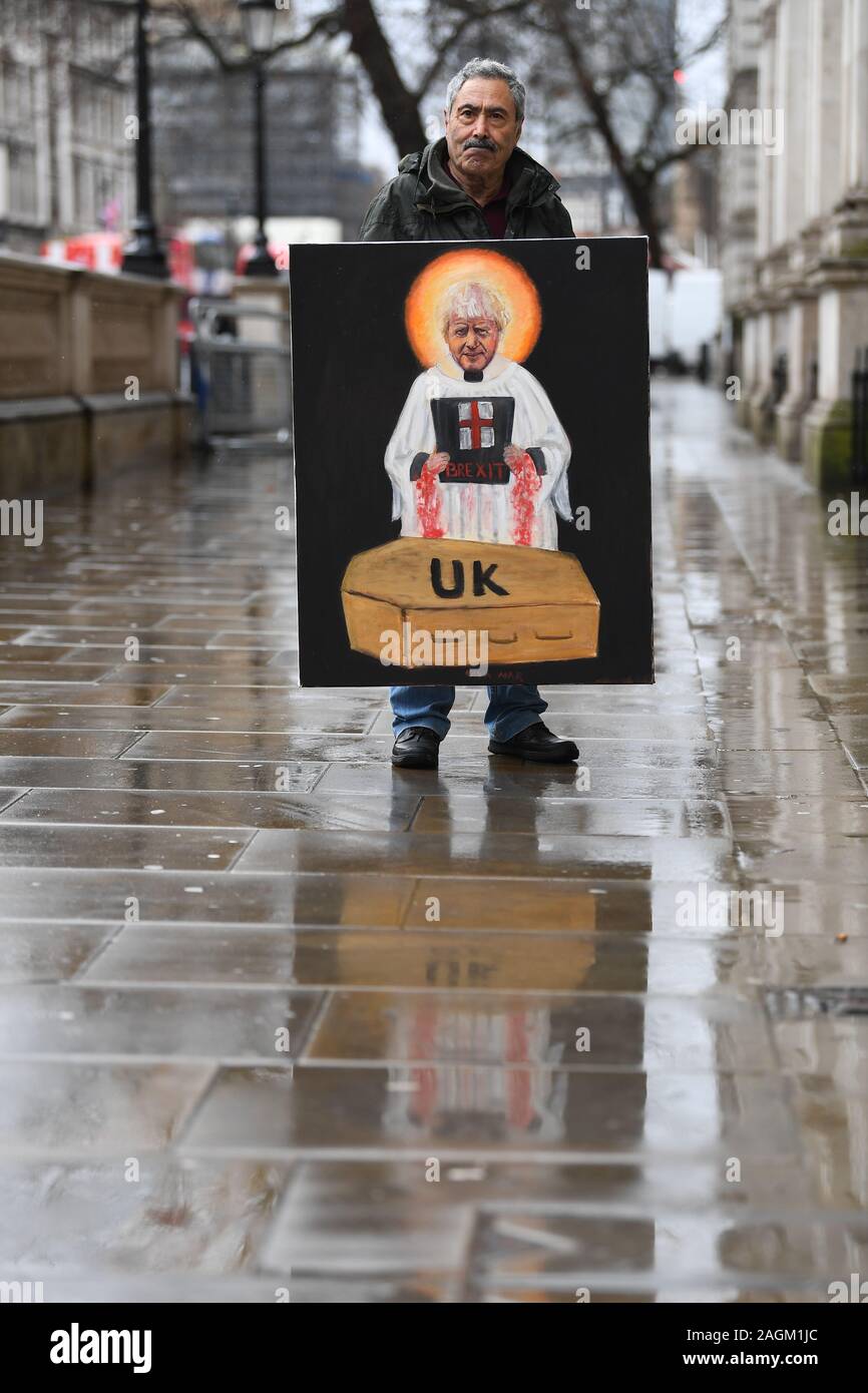 Political artist Kaya Mar outside Downing Street, London, on the day the government has published a revised version of its Withdrawal Agreement Bill (WAB) to ensure that it can take the UK out of the EU on 31 January. PA Photo. Picture date: Friday December 20, 2019. See PA story POLITICS Brexit. Photo credit should read: Victoria Jones/PA Wire Stock Photo
