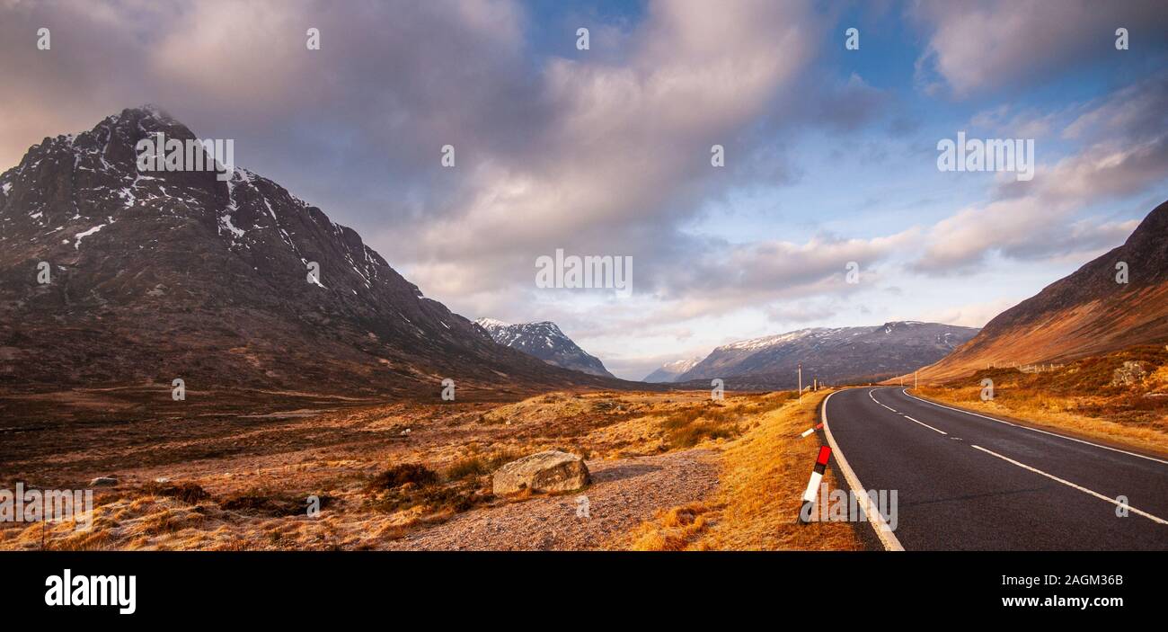 The A82 road winds across Rannoch Moor and under the mountains of Glen Coe in the Highlands of Scotland. Stock Photo