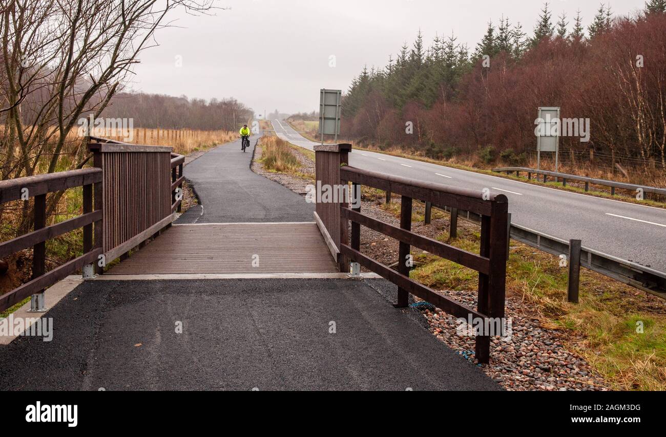 The National Cycle Network 'Caledonia Way' runs through Barcaldine Forest in Argyll in the Highlands of Scotland. Stock Photo