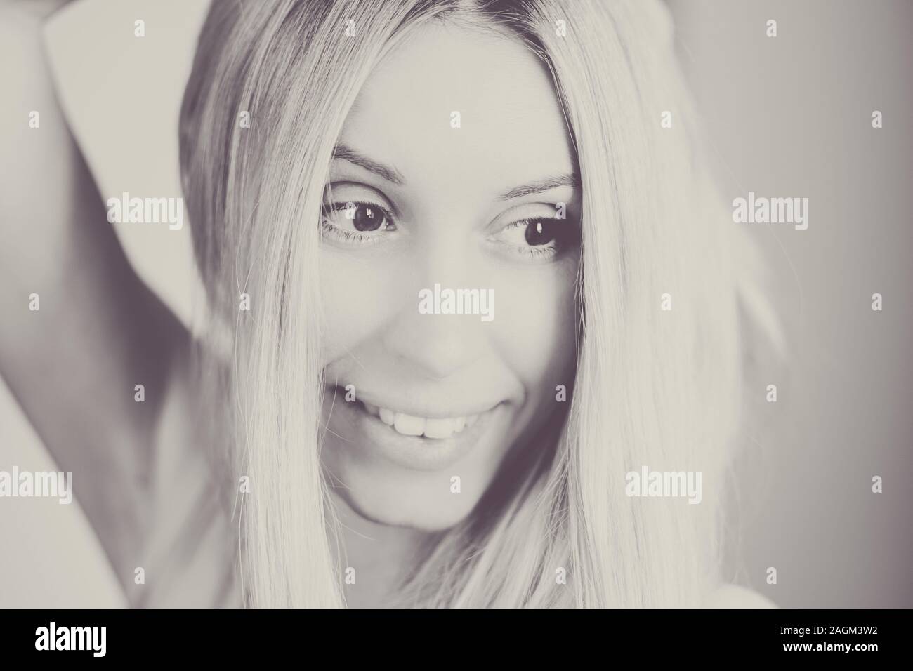 Smiling young woman portrait, lovely girl, black and white photo. Stock Photo