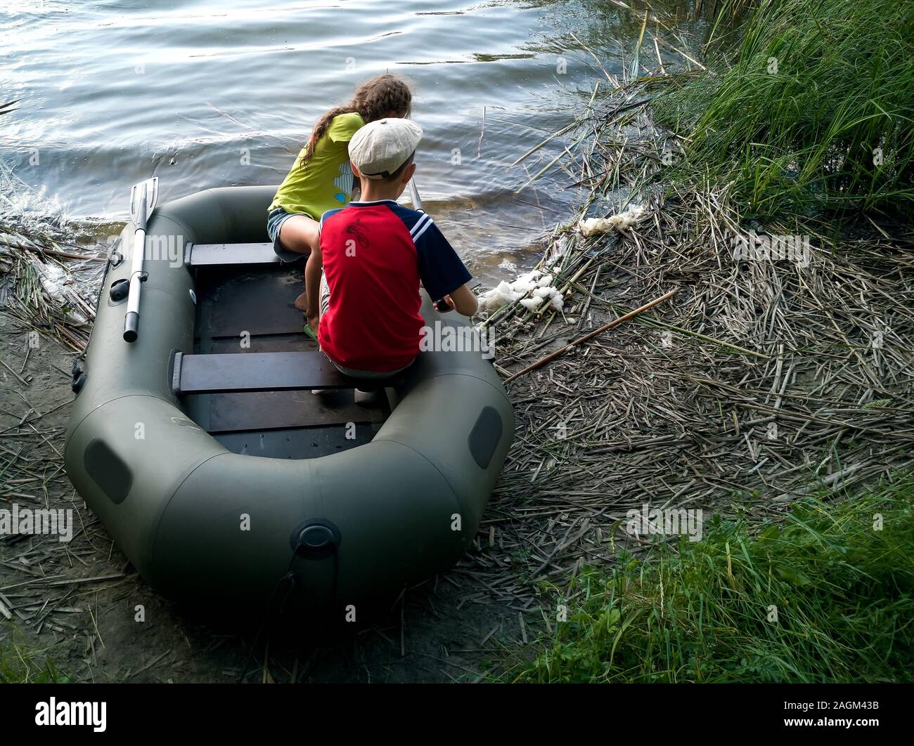 Inflatable boat children hi-res stock photography and images - Alamy
