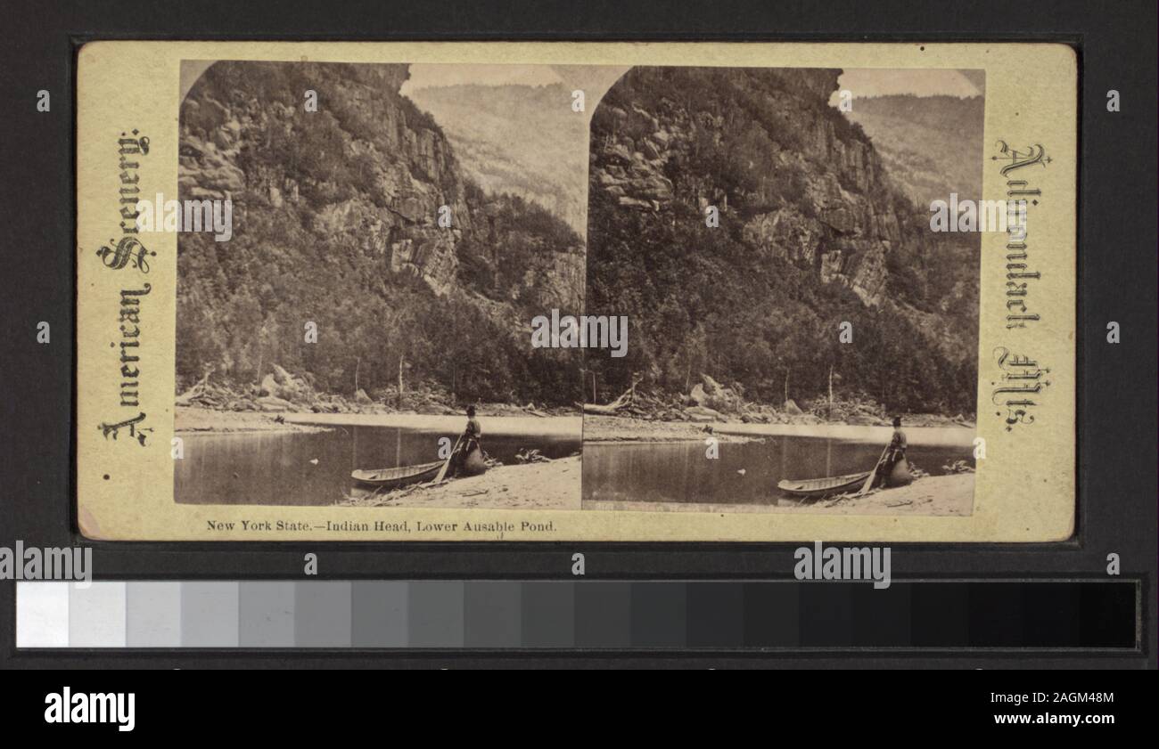 New York State Indian Head, Lower Ausable (Au Sable) Pond  Robert Dennis Collection of Stereoscopic Views. Views of Au Sable Chasm, Birmingham and Horseshoe falls, including winter views; views of rocks, bridges, stairs, boats, and tourists, and views of Keeseville, including bridges and streets. Includes two hand-colored views. Includes views by G. W. Baldwin, R. M. McIntosh, H. S. Tousley and other photographers and publishers.; New York State. Indian Head, Lower Ausable [Au Sable] Pond. Stock Photo