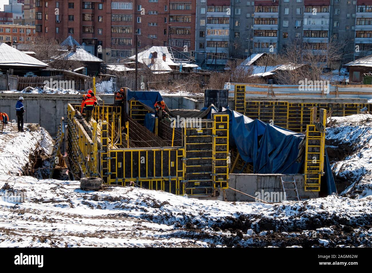 Workers construction of new bridge in Tyumen Stock Photo