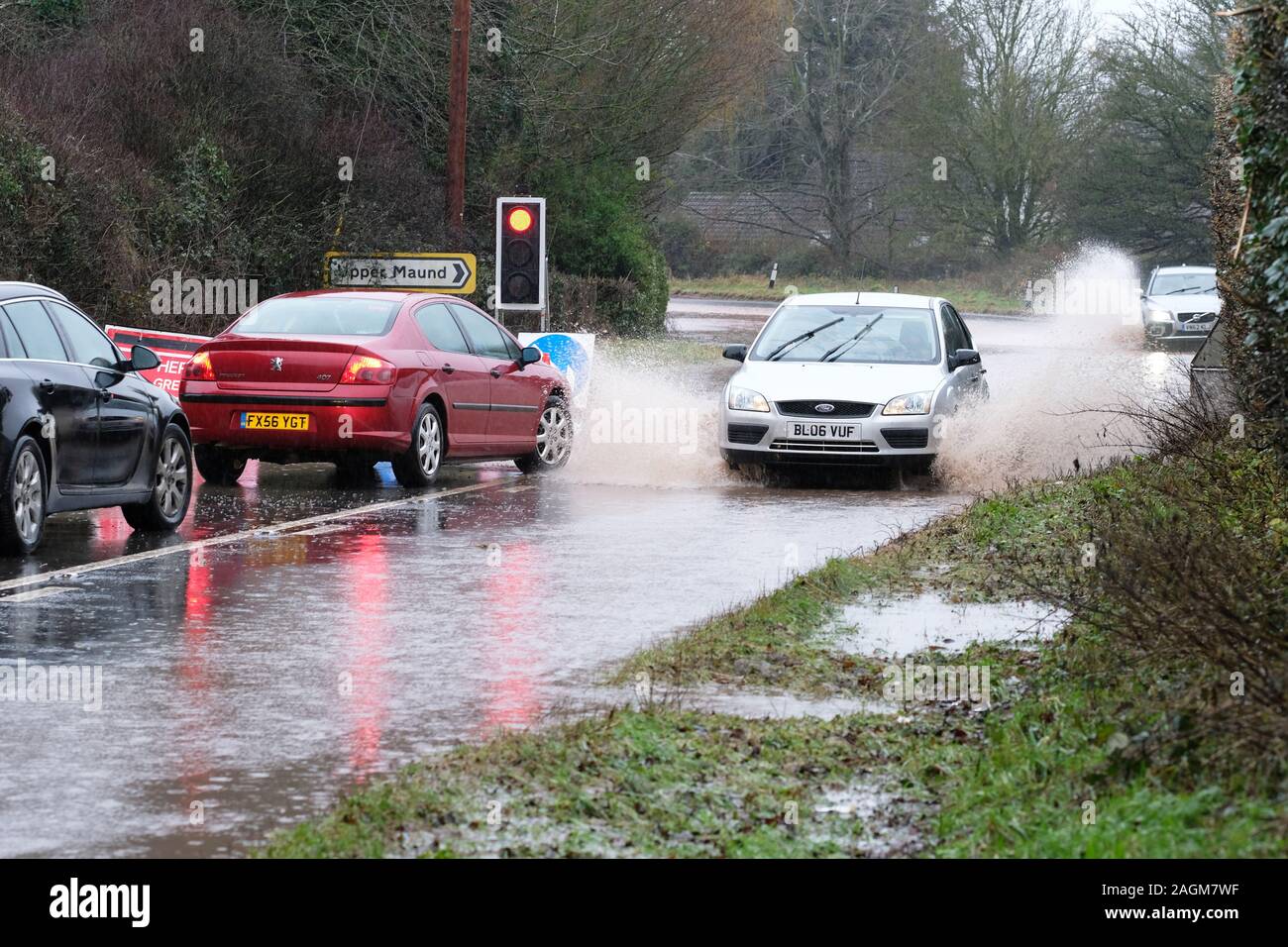 Maund Bryan, near Bodenham, Herefordshire, UK - Friday 20th December 2019 - Further heavy rain after a very wet winter has resulted in surface flooding on the main A417 road at Maund Bryan causing problems for drivers - Photo Steven May / Alamy Live News Stock Photo