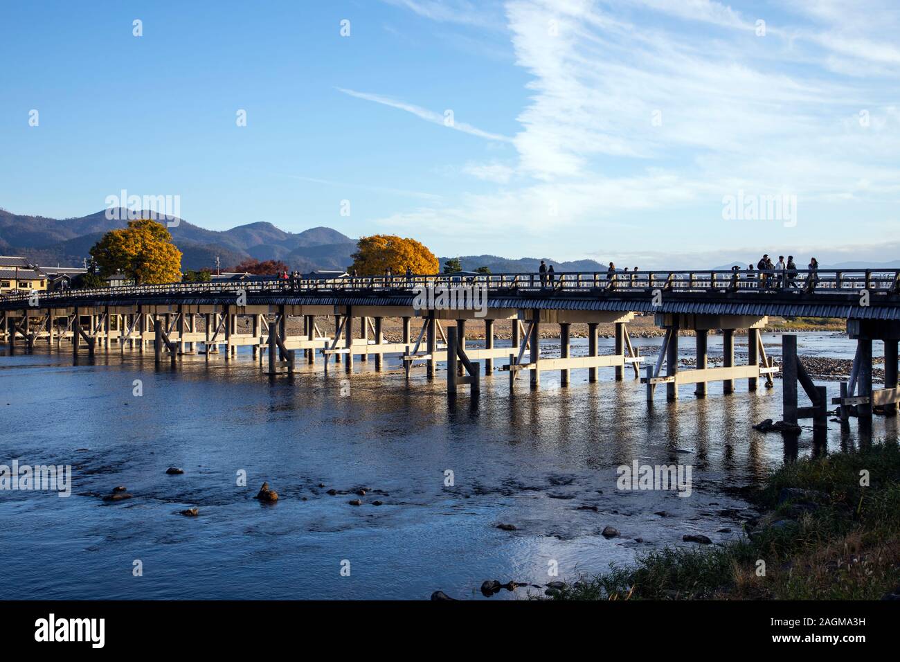 KYOTO, JAPAN -23th November 2019: Arashiyama is an area in western Kyoto centered around the Katsura River and surrounding mountains Stock Photo