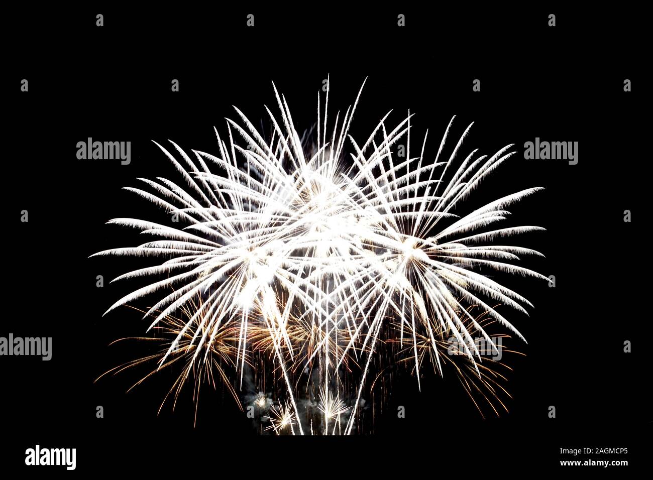 Fireworks light up in the night sky, celebration concept. Stock Photo