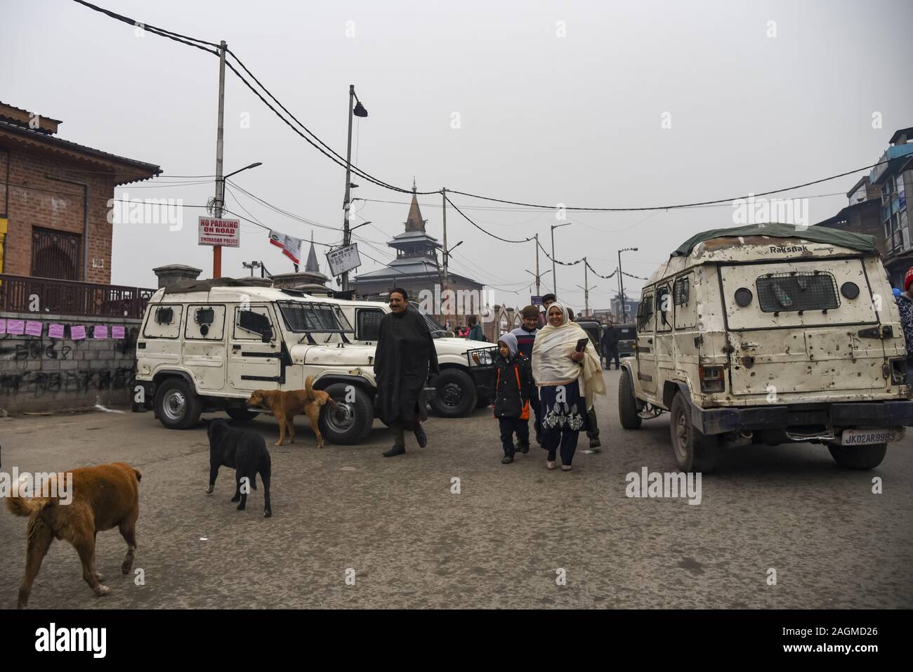 Kashmiri People Walk Past Indian Armoured Vehicles During Friday Prayers Outside The Jamia Masjid Gate In Srinagar The Jammu And Kashmir Administration Allowed People To Offer Friday Prayers At The Iconic Jamia Masjid