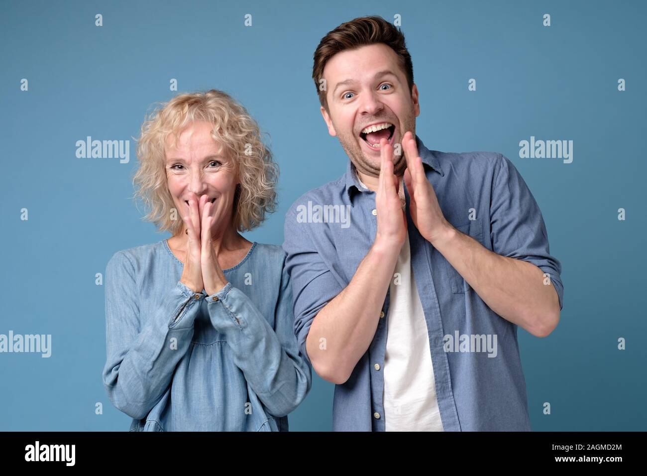 Caucasian people man and woman expressing their excitement and delight ...