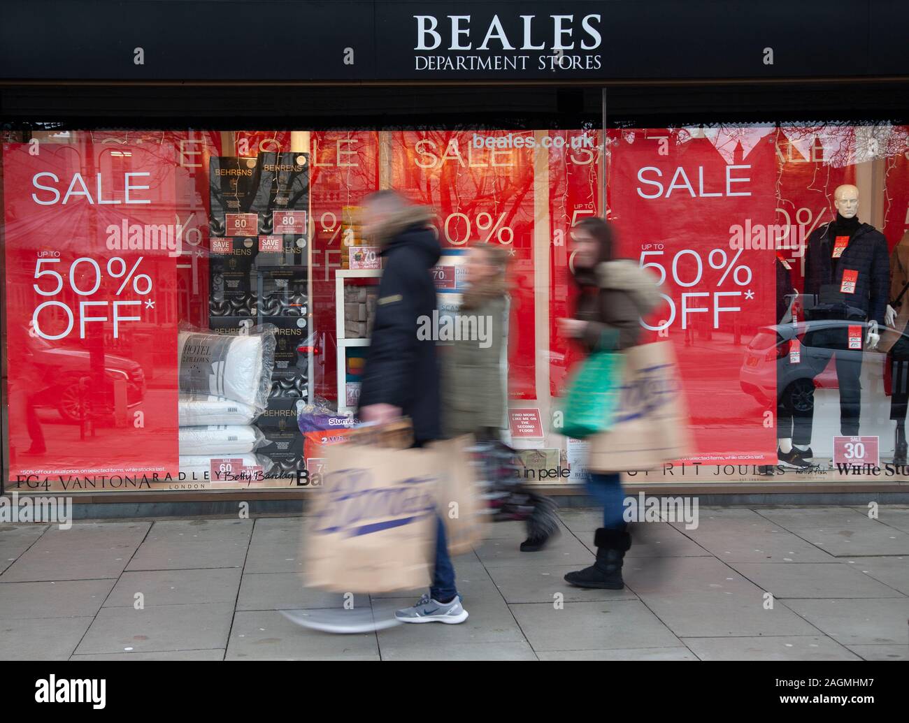 Friday Frenzy in Southport, Merseyside. UK Weather 20th December, 2019. Beales formerly Broadbents and Boothroyds;  Busy shopping day in the Town Centre U.K. retailers have embraced the pre-christmas sale bonanza, with many customers left surprised by bargain discounts, enjoying a Xmas spend & carrying a number bags, gifts, presents and sale items. Credit: MediaWorldImages/AlamyLiveNews. Stock Photo
