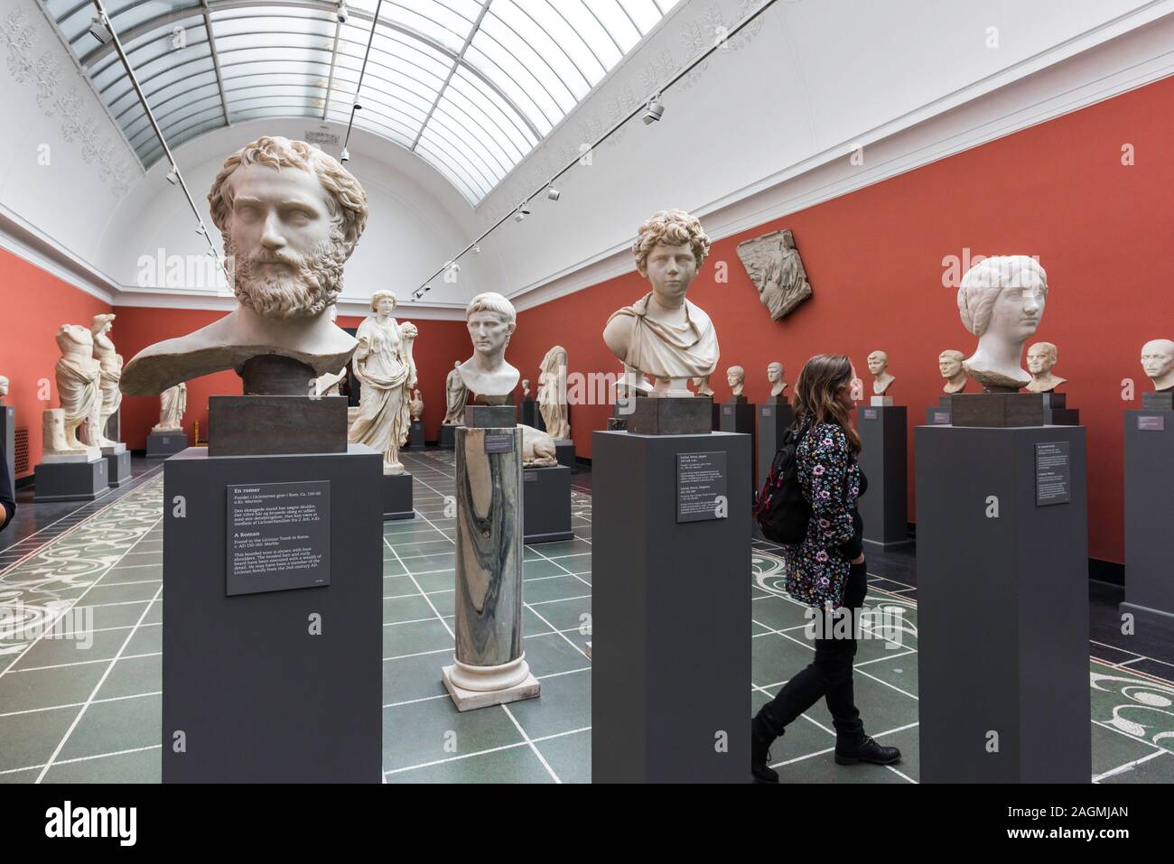 Ancient Roman sculpture, view of ancient Roman and Greek busts inside the Ny Carlsberg Glyptotek museum in Copenhagen, Denmark. Stock Photo