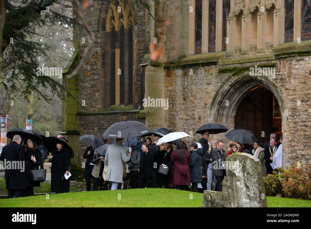 Mourners leave the memorial service of London Bridge terror attack victim Saskia Jones, held at Holy Trinity Church in Stratford-upon-Avon. Stock Photo