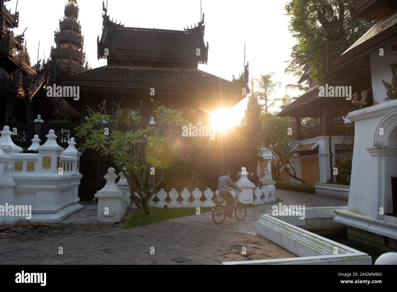 Chiang Mai, Thailand. 22nd Oct, 2019. A man rides on a bicycle through the grounds of the Dhara Dhevi Hotel. Credit: Sebastian Kahnert/dpa-Zentralbild/dpa/Alamy Live News Stock Photo