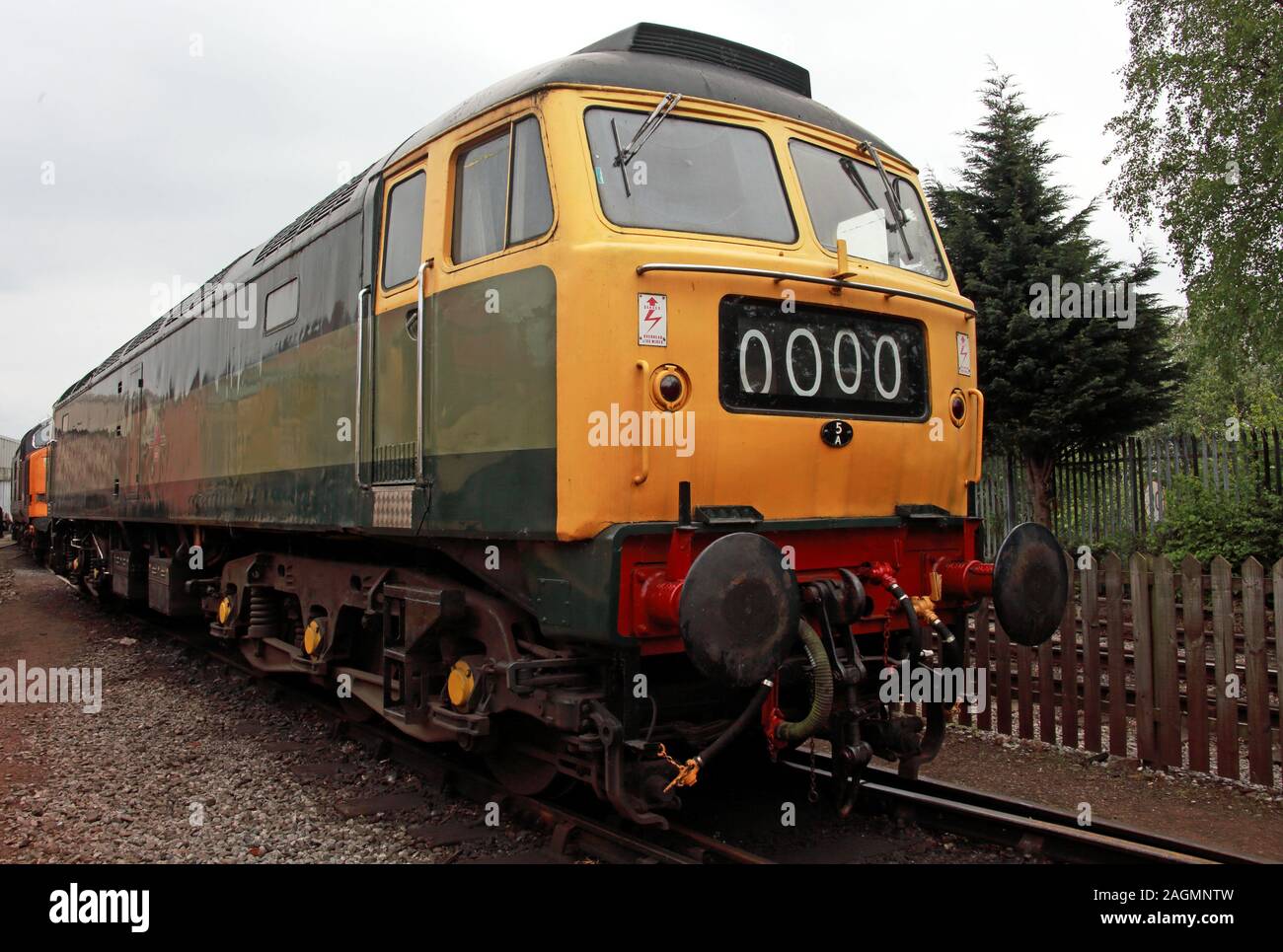 Class 48 British Rail Diesel Engine, in green and yellow livery - 0000 , IM45, Brush Type 4, in goods sidings yard, England, UK Stock Photo