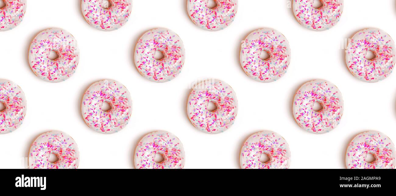 Creative background with delicious glazed donuts Stock Photo - Alamy