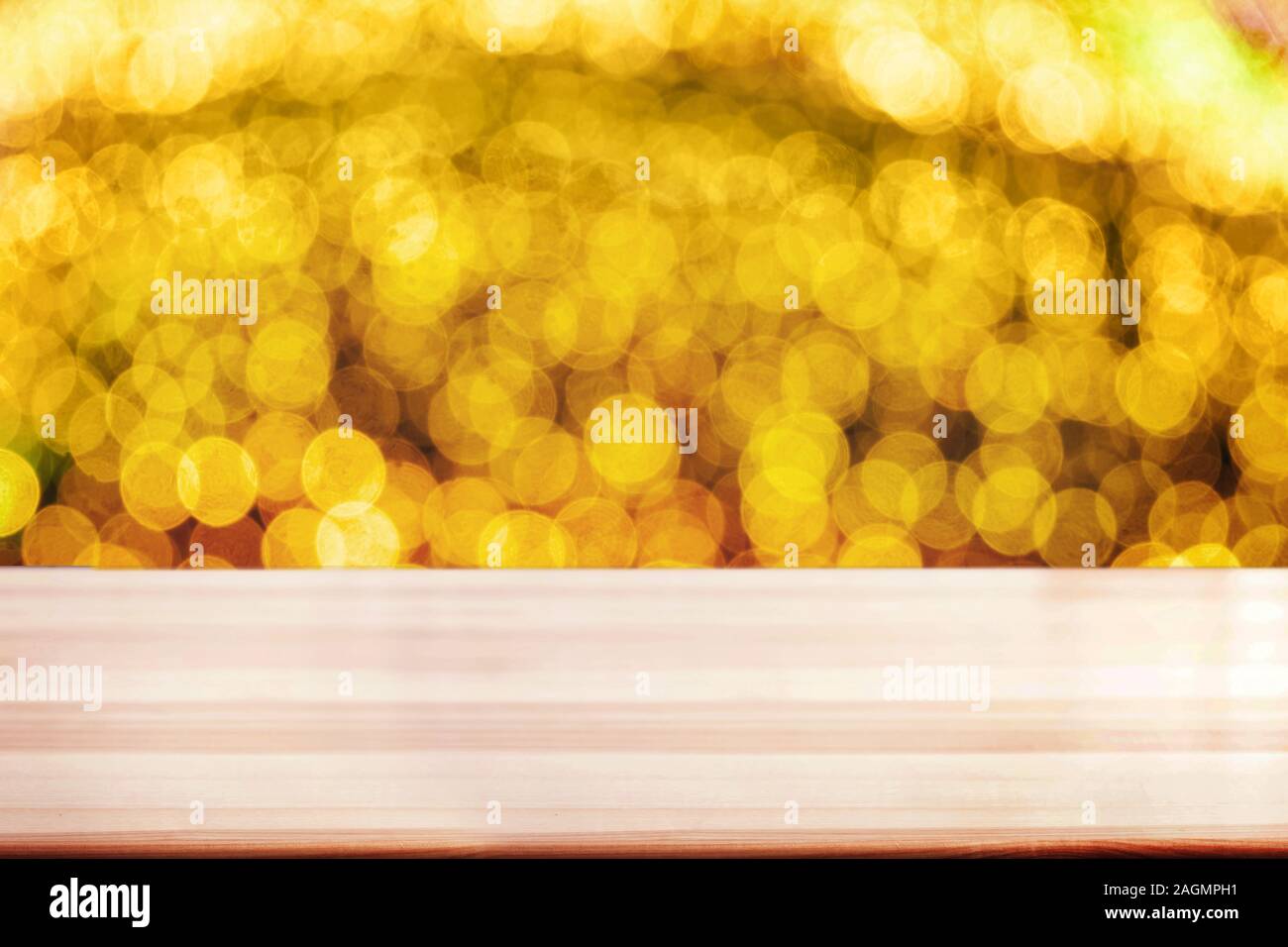 Top wood table on gold bokeh background hi-res stock photography and ...