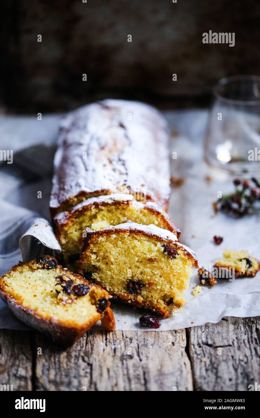 Sliced cardamom and cranberry pound cake Stock Photo