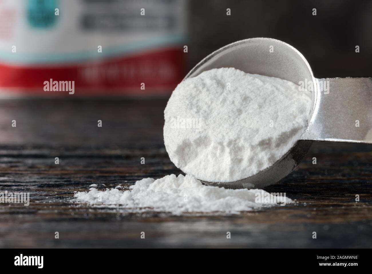 Baking Powder Spilled from a Teaspoon Stock Photo Alamy