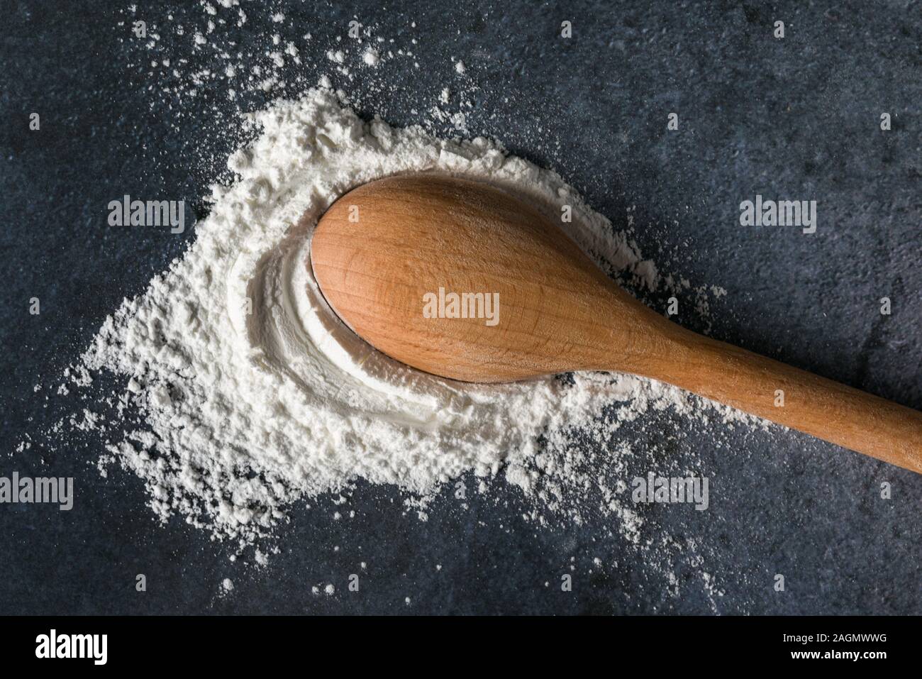 Baking Powder Spilled from a Teaspoon Stock Photo Alamy