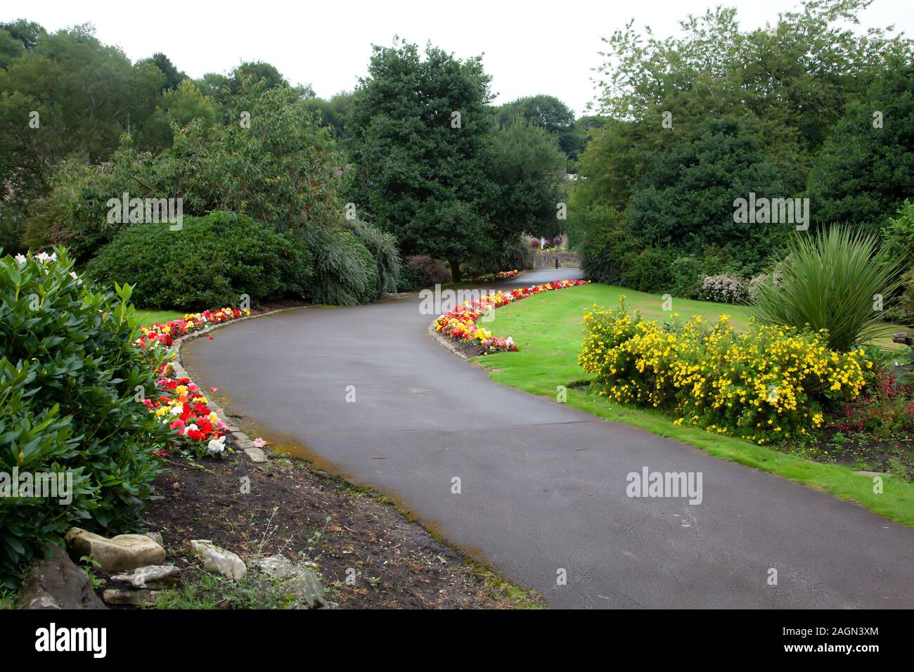 A view of Haworth's Central Park in West Yorkshire during August with beautiful displayed and colourful flower beds Stock Photo
