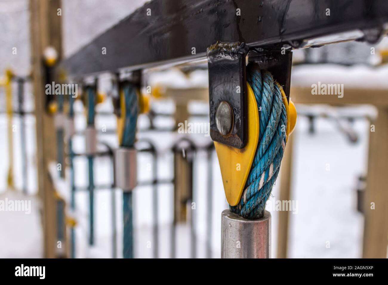 Closeup of the suspension bridge cable fastener. Tension cable and its