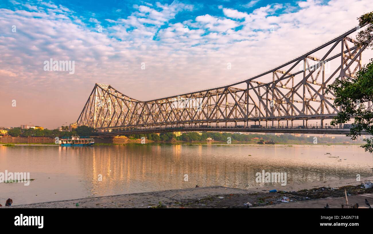 Howrah Bridge is a bridge with a suspended span over the Hooghly River in West Bengal, India. Stock Photo