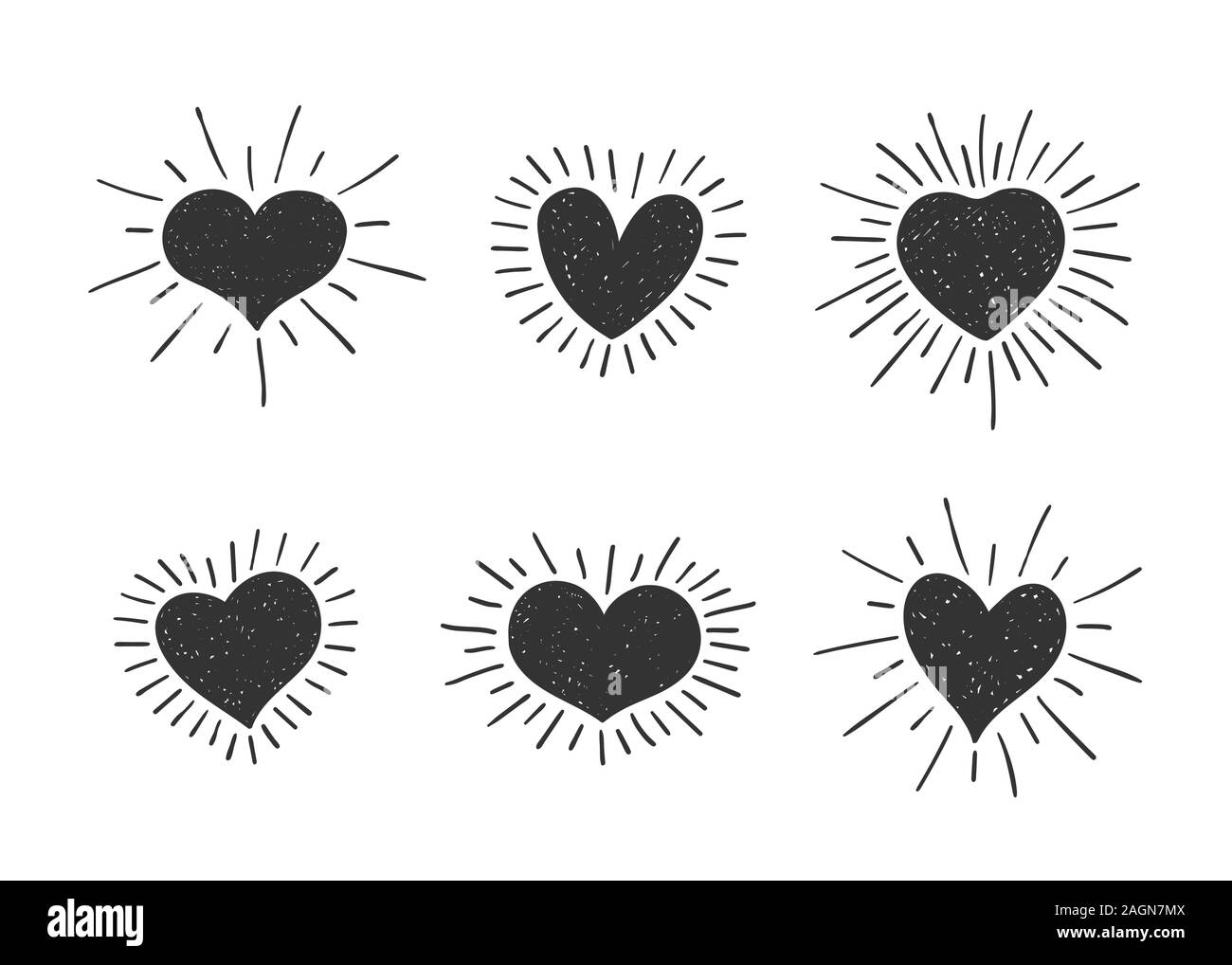 Set of doodle heart shaped symbols with retro styled sun rays