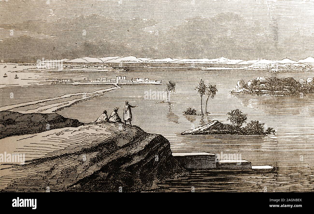 A 19th century engraving showing the Nile, Egypt, in flood, celebrated by Egyptians as an annual holiday and by the Coptic Church by ceremonially throwing a martyr's relic into the river, hence the name, the 'Martyr's Finger'. In mythology   it signifies the shedding of Isis's tears of sorrow for her dead husband, Osiris Stock Photo
