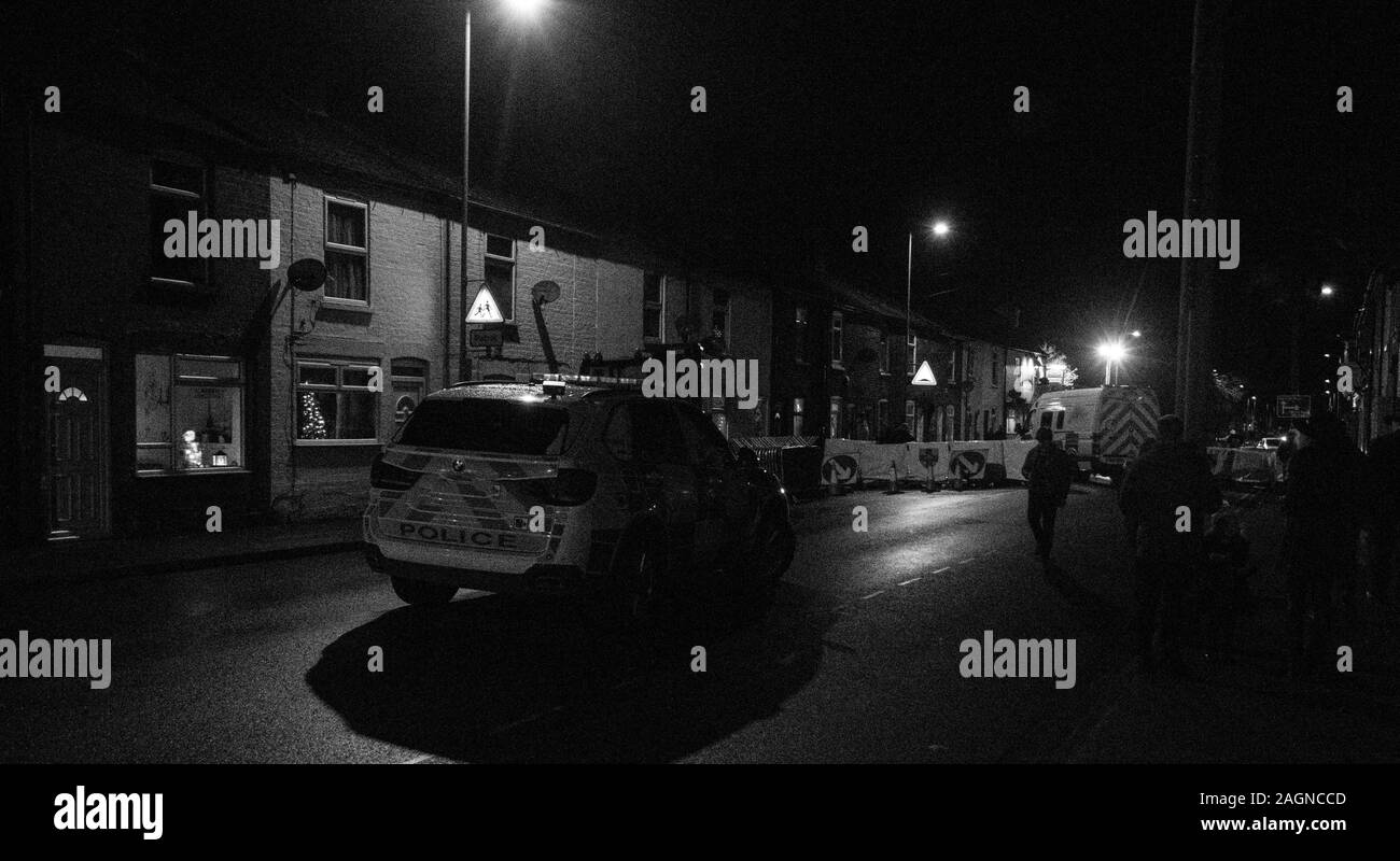 Security forces blockade a typical street in the United Kingdom to prevent any terrorism attacks. Stock Photo