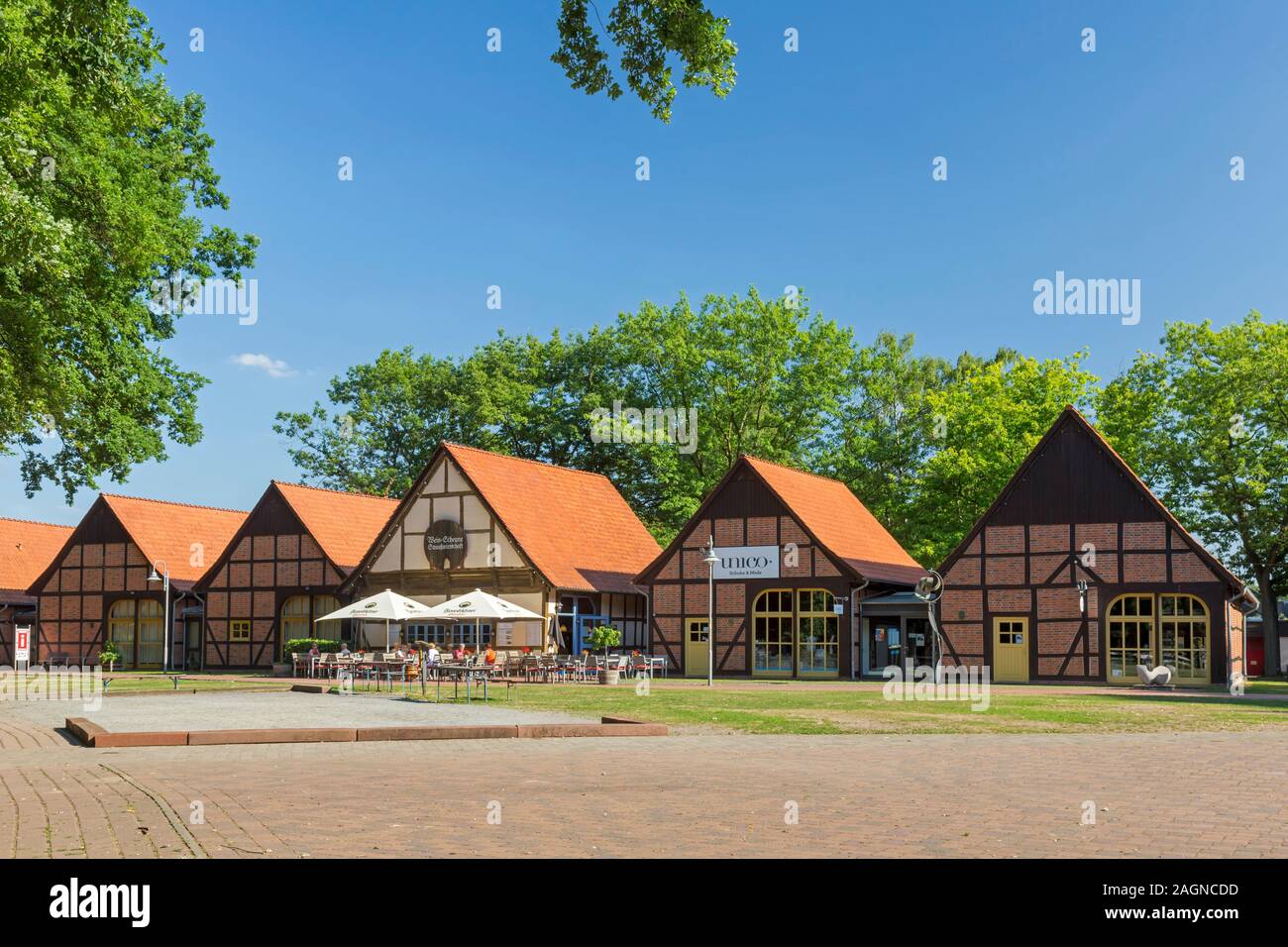 18th century timber framed houses / barns at the village Steinhude in the borough of Wunstorf in Hanover Region, Lower Saxony / Niedersachsen, Germany Stock Photo