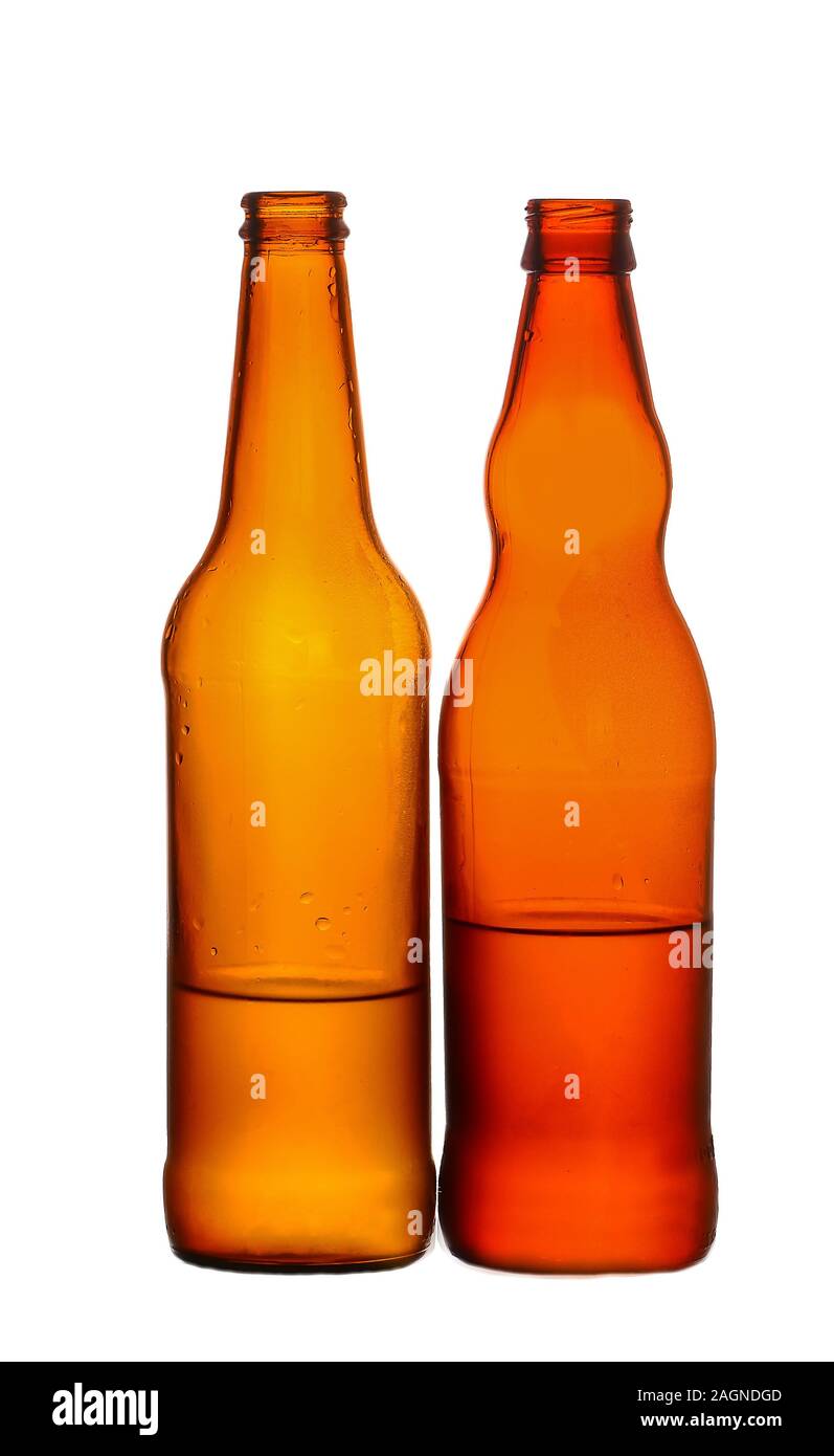 Empty glass bottles that can be used for different drinks. Stock Photo