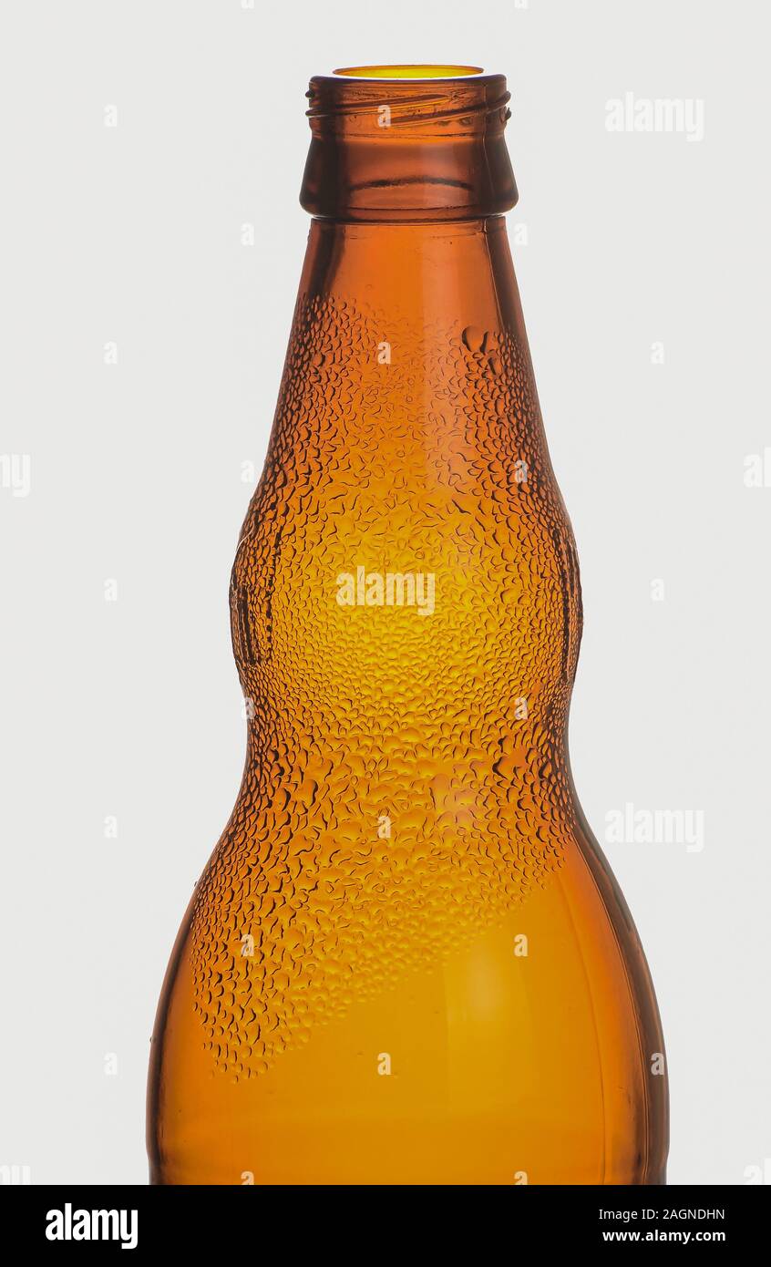 Empty glass bottles that can be used for different drinks. Stock Photo