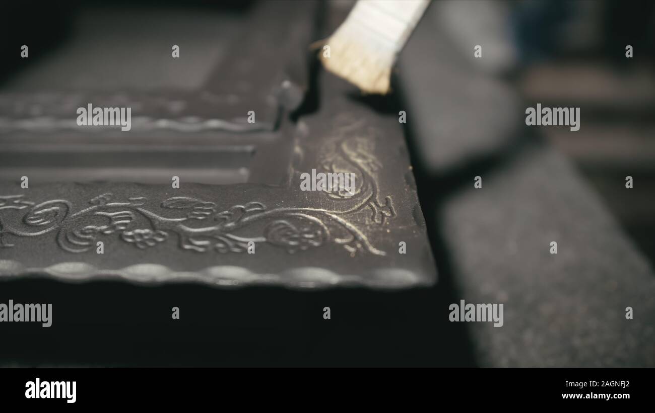 The product is artificially aged. Gold powder painting