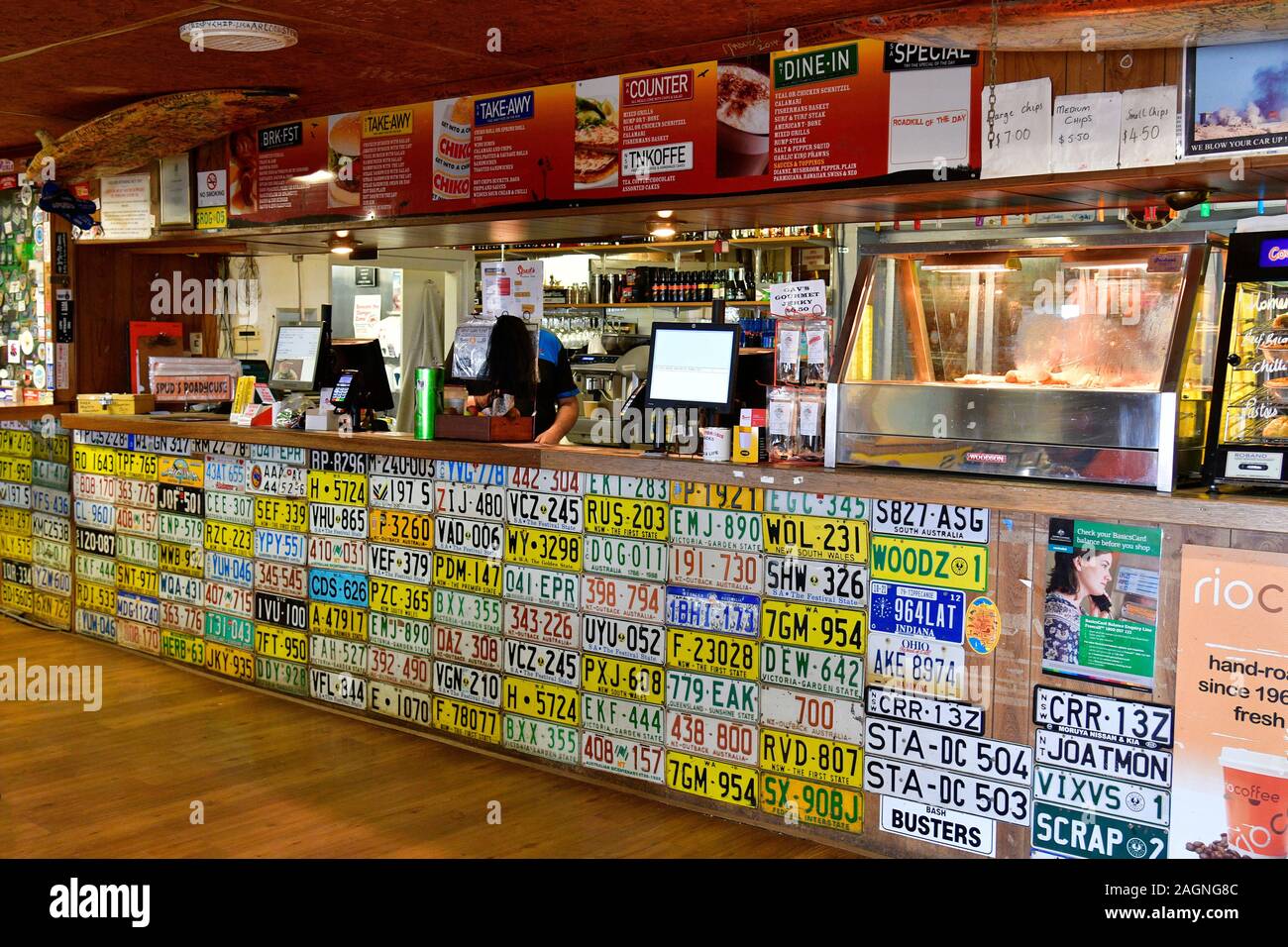 Pimba, SA, Australia - November 12, 2017: inside Spud's roadhouse with lot of license plates, preferred stop for food and drink on Stuart highway Stock Photo