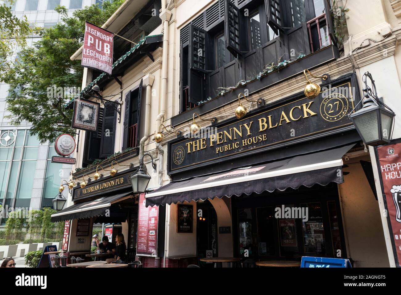 The Victorian London Pub and The Penny Black Pub on the River Sing opposite Clarke Quay, Singapore Stock Photo