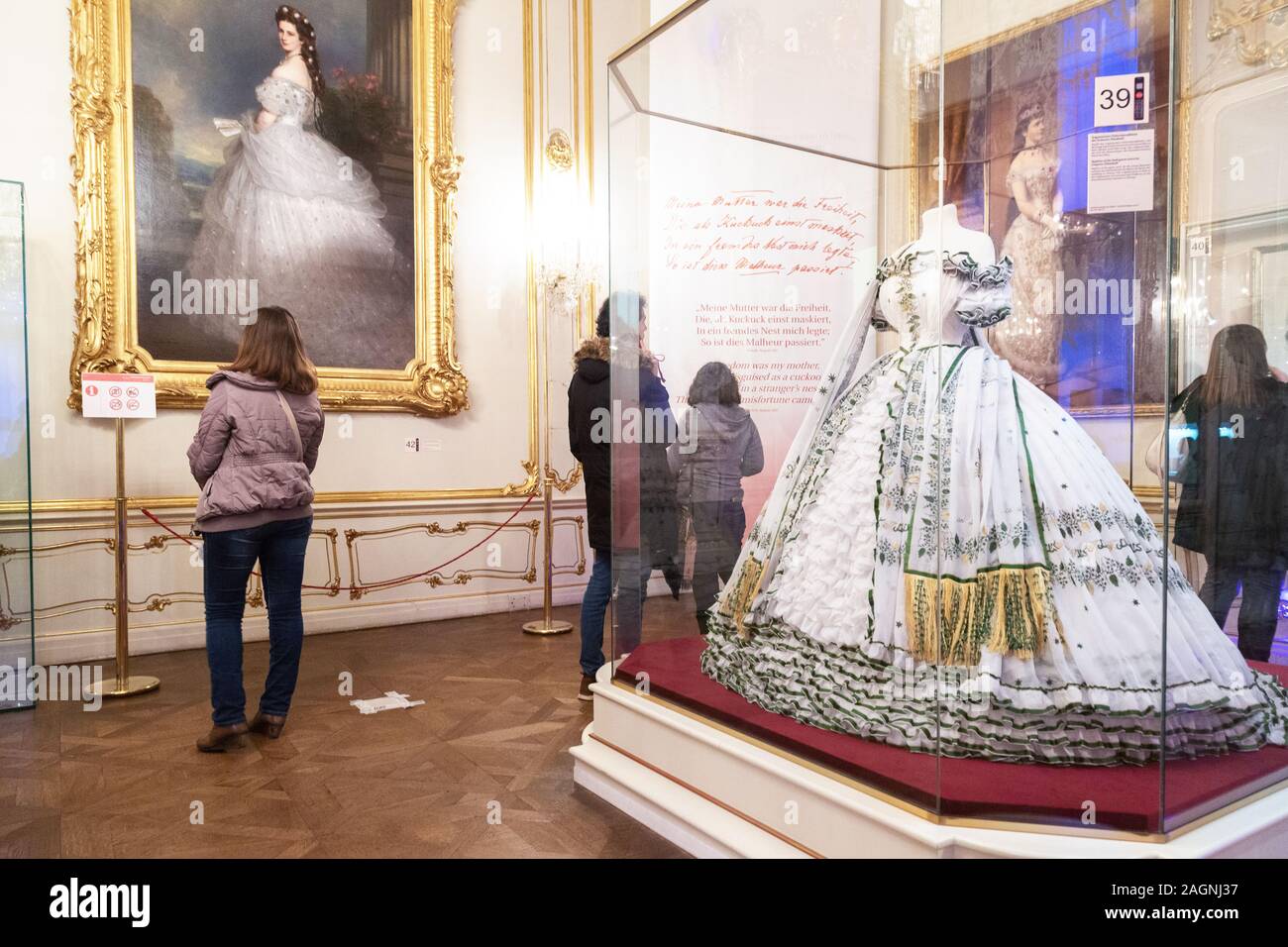 People looking at exhibits in the Sisi Museum Vienna,  interior; Hofburg Palace, Vienna Austria Europe Stock Photo