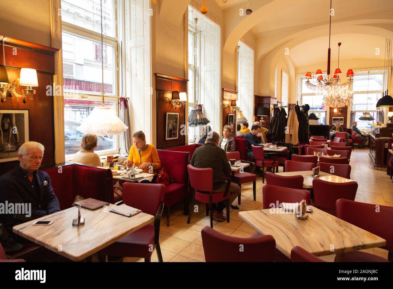 Cafe Diglas Vienna interior, people eating and drinking in one of the well known coffee houses of Vienna Austria Stock Photo