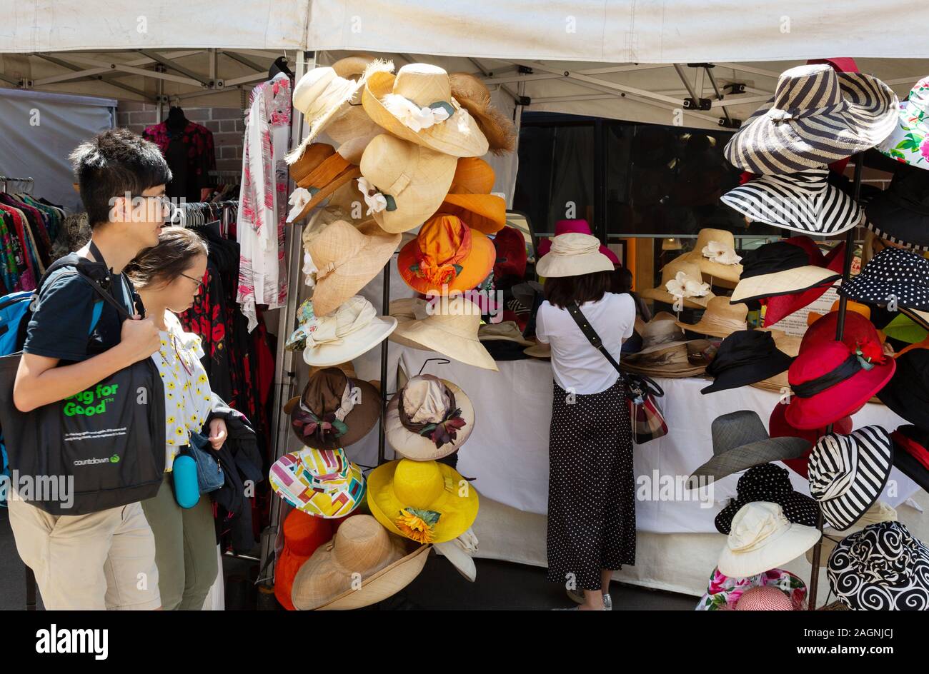 The Rocks market, Sydney Australia - people shopping at the stalls on a sunny day in summer, the Rocks, Sydney Australia Stock Photo
