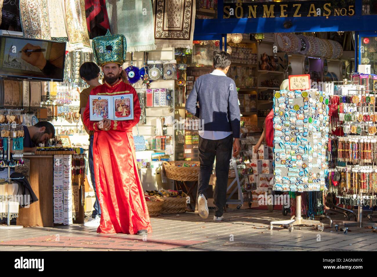 ISTANBUL, TURKEY-MAY 30,2015: Turkish traditional hats and dresses in a tourist store of Sutlanahmet in Istanbul. Stock Photo