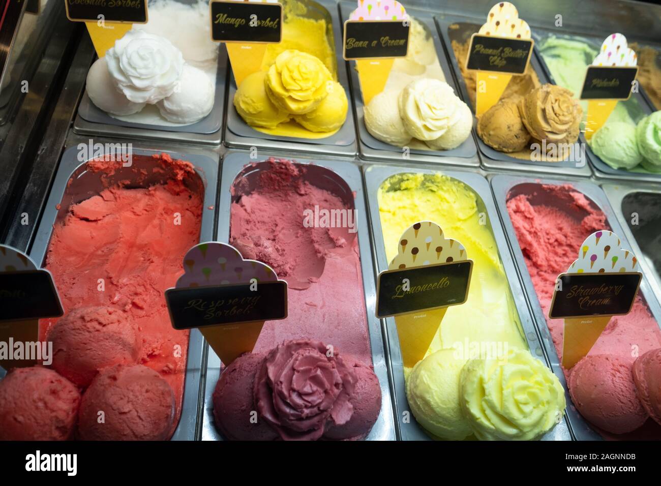 Classic italian gourmet gelato gelatto ice cream flavors on display in shop Stock Photo